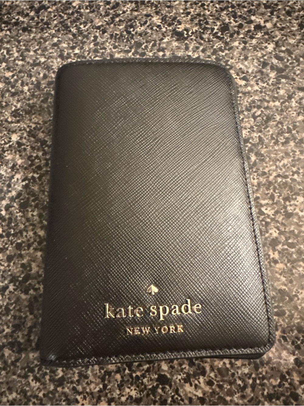 kate spade black leather passport holder with gold logo